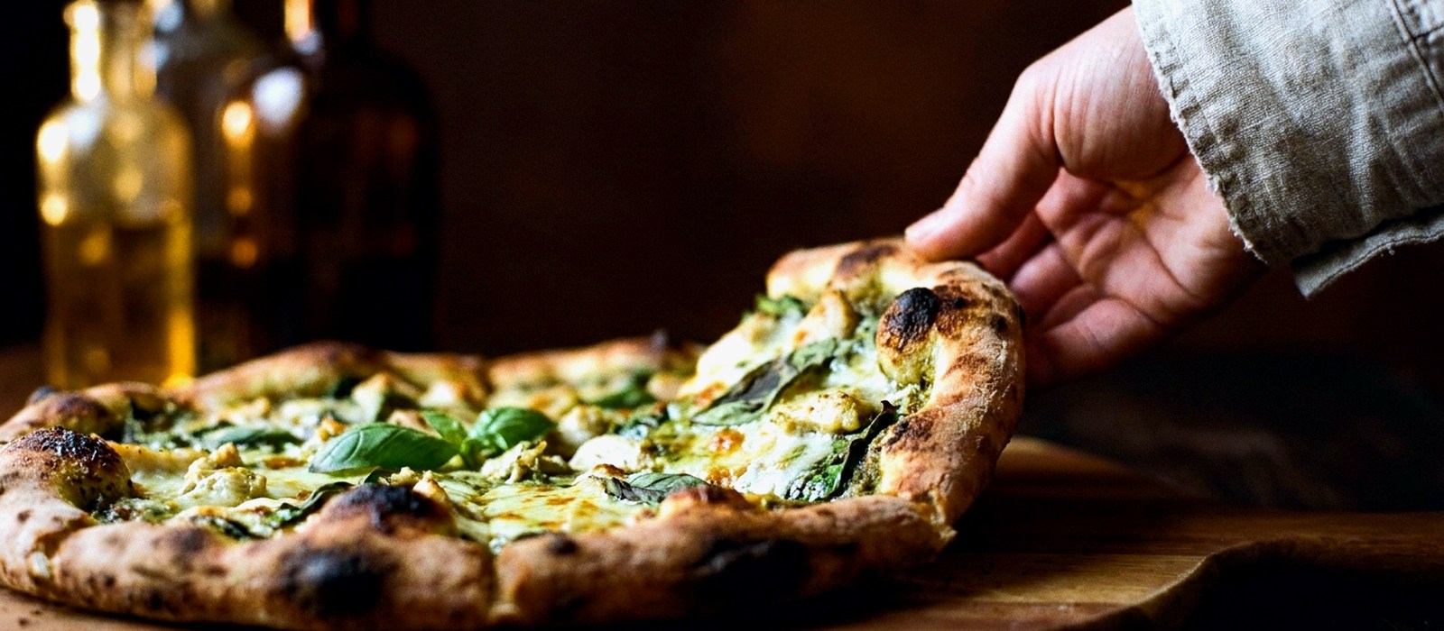A loaded organic pizza fresh from the oven at Redwood Pizzeria, Felton